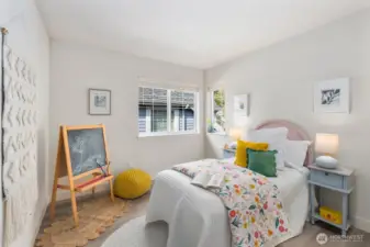 One of two additional bedrooms.  This is to the right as you come up the stairs and down the hallway.