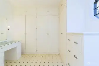 Ample closet space, drawers and a convenient vanity
