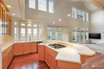 Kitchen with gas cooktop and an abundance of counter space; ready for your culinary creations.