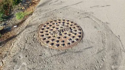 sewer in front of property