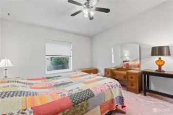 Primary Bedroom w/Vaulted Ceilings and Ceiling Fan.