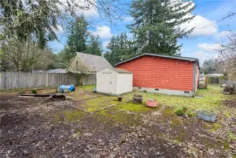 Backyard w/Shed and plenty of gardening space!