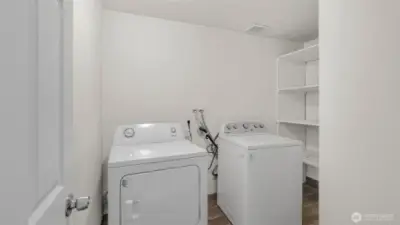 Large utility room with storage & appliances stay!