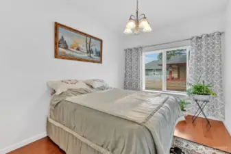 Bedroom 2 gets plenty of natural light.  Hardwood floors throughout the entire home.  No carpets to clean; ever!
