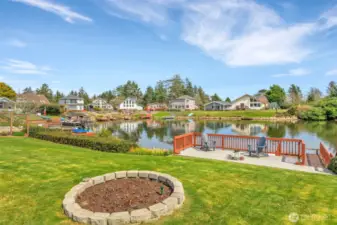 Flower bed or fire pit?  The owner uses this as a flower bed but it can easily be a fire pit if that suits your needs.