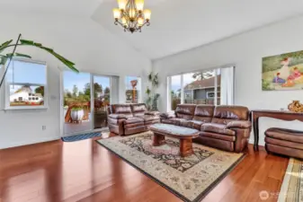 The living room is spacious and attracts tons of light. The ceilings are vaulted and the view to Duck Lake can be seen from anywhere in the room. Genuine hardwood flooring throughout the home gives it a warm feeling.