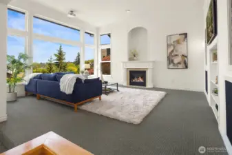 Floor to ceiling windows.  Cozy up with a book by one of the 3 gas fireplaces