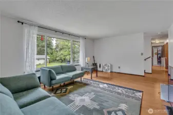 Living room with large bay window.