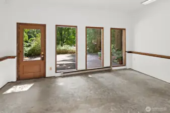 Garage converted to office/flex space.