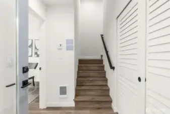 Welcoming entry with convenient storage, setting the tone for a refined interior.