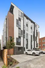 Modern architecture meets urban convenience with EV-ready parking.