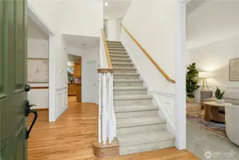 Carpet is new & abundant hardwoods are completely refinished.