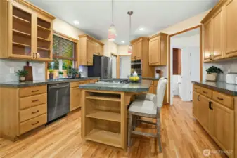 Extra storage in the island, & fine pendant lighting above