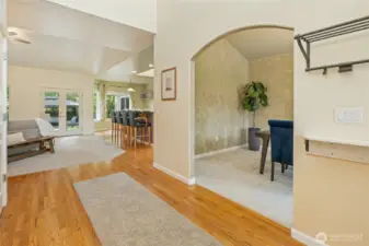 Open concept great room, with formal dining room to right and den to left