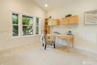 French doors lead to light filled office space