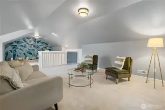 Upstairs is a massive bonus room for play, entertaining, storage or work.
