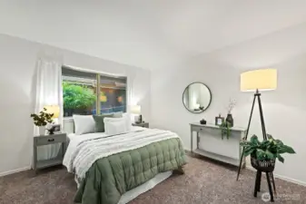 Second bedroom is spacious, easily fitting a queen size bed.