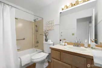 Hall full bath has easy access located right across from the second bedroom.