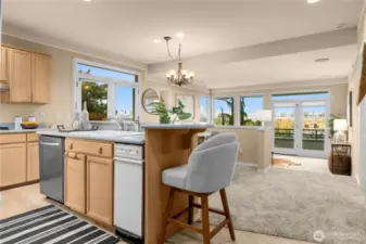 After coming down the entrance hall - this open floor plan and windows are stunning!