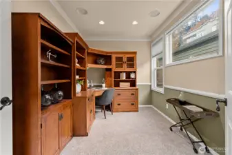 There is also a bonus room / den / office with French doors. This quality desk and shelving set can be included in the sale if you would like it.