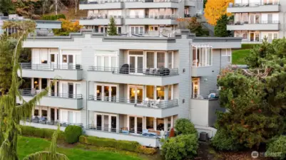 There are 6 units per building. Unit 303 is the middle Northeast corner (the one with two private decks)!