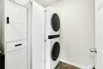 Upstairs Laundry Room:  Conveniently located near all the bedrooms, this modern laundry room makes washing and folding a breeze. Clean, efficient, and designed for everyday comfort.