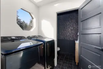 Mudroom/Utility room with half bath on main.