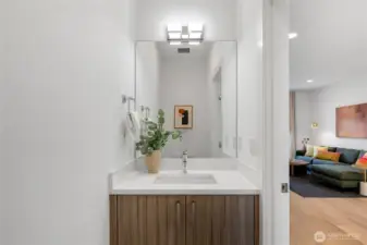 Well-appointed powder room conveniently located off the main living area.