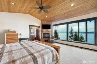 Enjoy views of the Cascade Mountains and Port Susan from the primary bedroom.