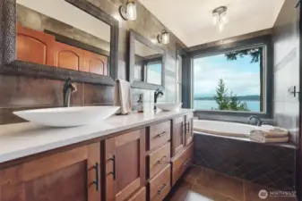 5-piece ensuite with private view, deep tub, double sinks and impressive shower.