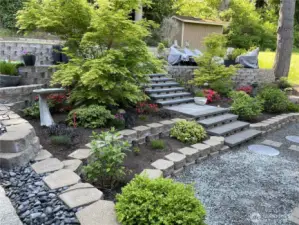 The terraced front yard is beautifully landscaped and a peaceful retreat.