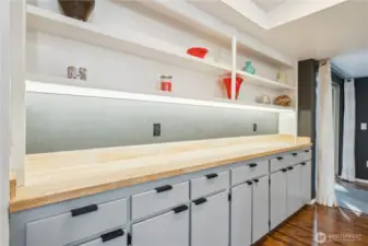 Built in display cabinet with tons of additional storage.