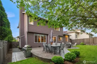 Spacious stamped concrete patio—ideal for outdoor dining, barbecues, and summer gatherings.