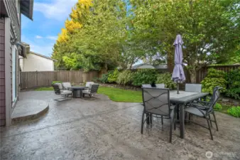Custom stamped patio with seamless flow from house to yard—perfect for everyday living.