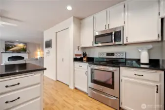 Well-equipped kitchen with stainless steel appliances, granite countertops, and ample cabinet space—perfect for daily cooking or weekend baking.