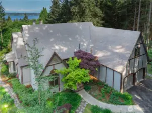 Full of character and architectural charm, this unique Tudor-style home blends the elegance of a French Tudor front with the classic appeal of traditional horizontal slat siding at the rear. Nearby state beaches offer gorgeous, sandy beaches and a boat launch!