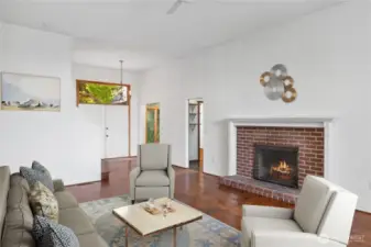 Another view of the great room and the cozy wood fireplace.