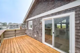 Deck off the Kitchen for you morning coffee and Sunrises