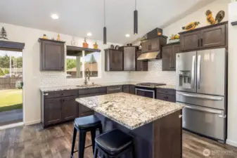 Custom kitchen with tile backsplash