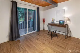 Main floor bedroom with private deck