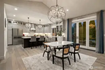 Abundant natural light floods this space from the custom French doors