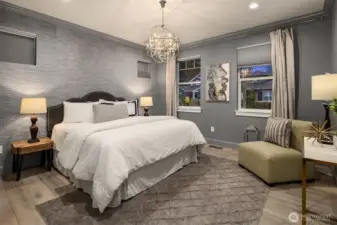 Sumptuous primary suite with imported English grass cloth wall paper is a study in timeless elegance