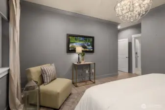 Custom draperies and blackout shades.  Elegant crown molding.