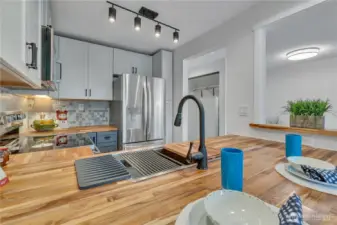 Stunningly updated kitchen with butcher block counters.