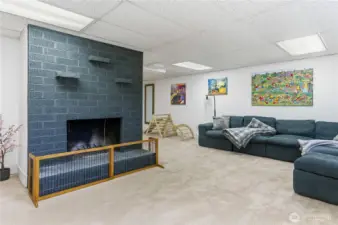 Lower Living Room with Wood Fireplace