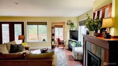 Inviting living room also has an office nook or cozy reading room