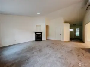 Livingroom view from kitchen  (corner propane fireplace)