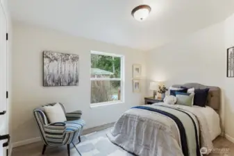 second bedroom with access to small catio