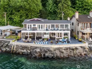 Wake up to breathtaking views of Seattle to the north, the Olympic peninsula to west, and stunning sunrises to the east-all from this exceptional waterfront home!