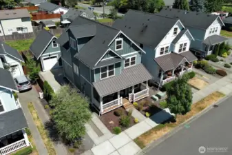 Long driveway (two long bed trucks fit), single car garage with "tool room" area plus framed in loft.